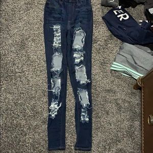 dark blue ripped jeans